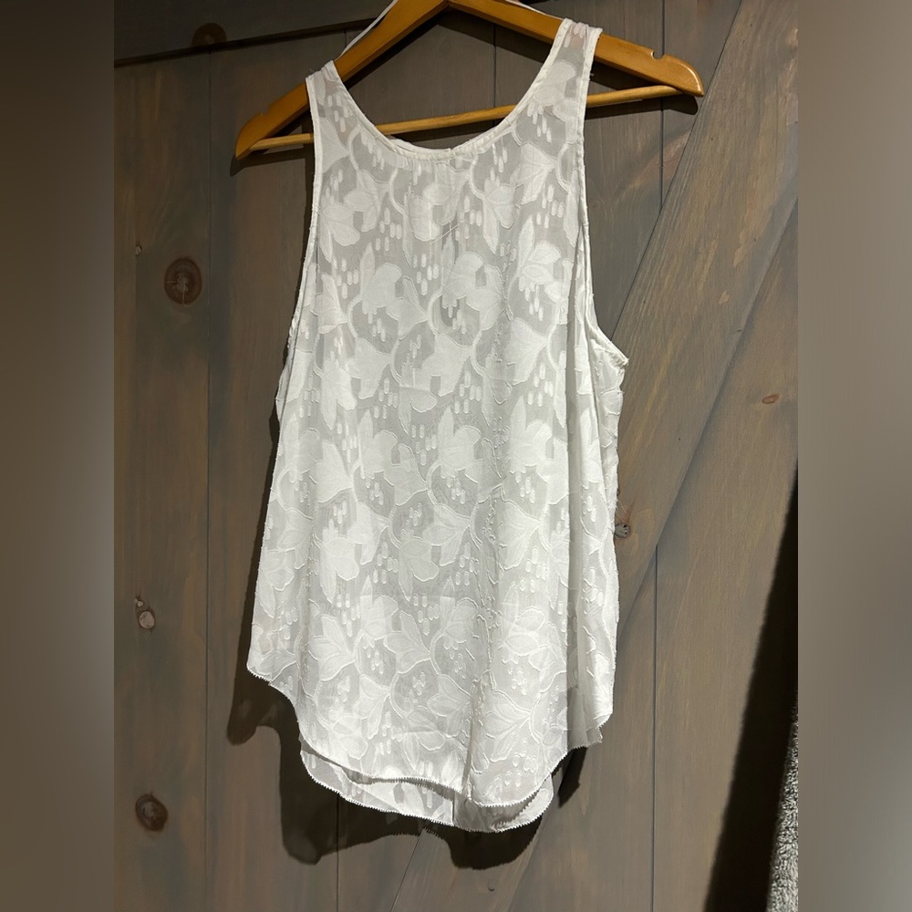 New without tags. Gorgeous white tank for summer!